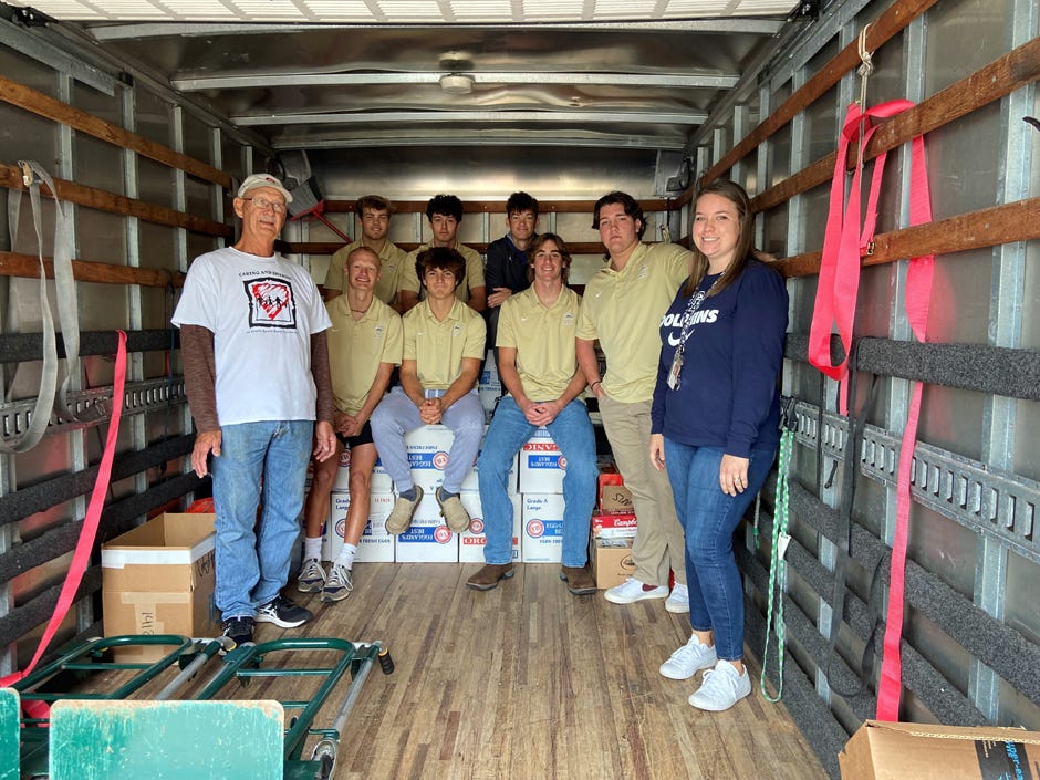 Gulf Breeze High School students collected a total of 2,385 items in a food drive competition against Navarre High School. Their participation in the Caring and Sharing Beach Soup Bowl competition will help Santa Rosa County families with their food needs through the Thanksgiving holiday.
