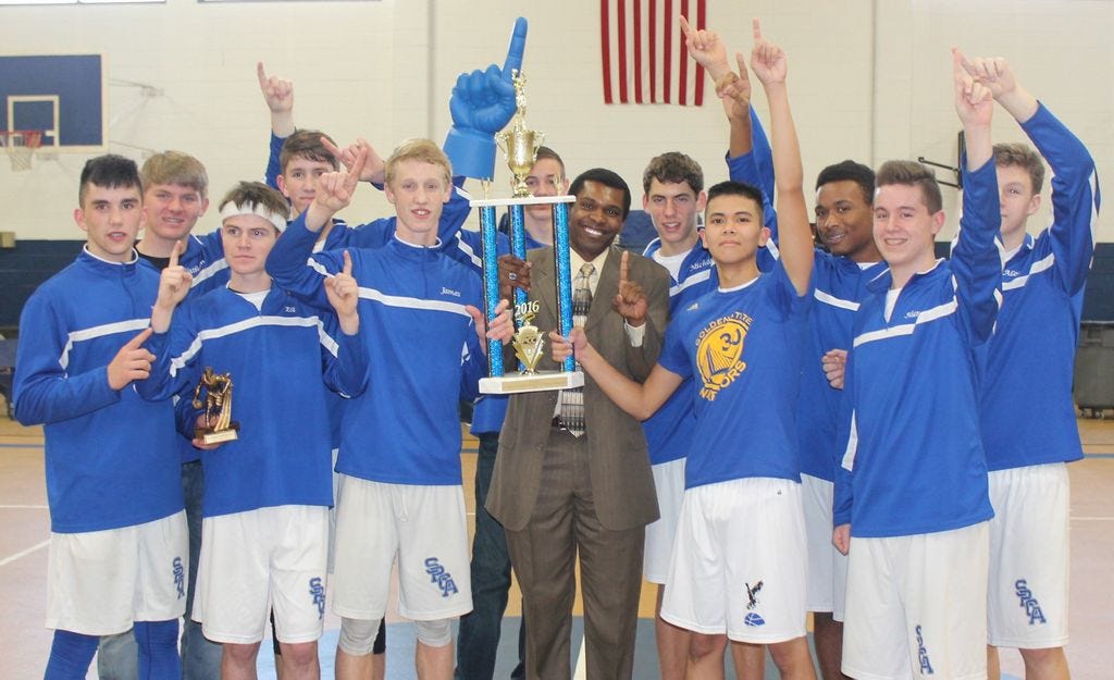 Coach Stephen Peoples and the Santa Rosa Christian Academy Eagles took the Panhandle Christian Conference Eastern Region trophy for the second year in a row.