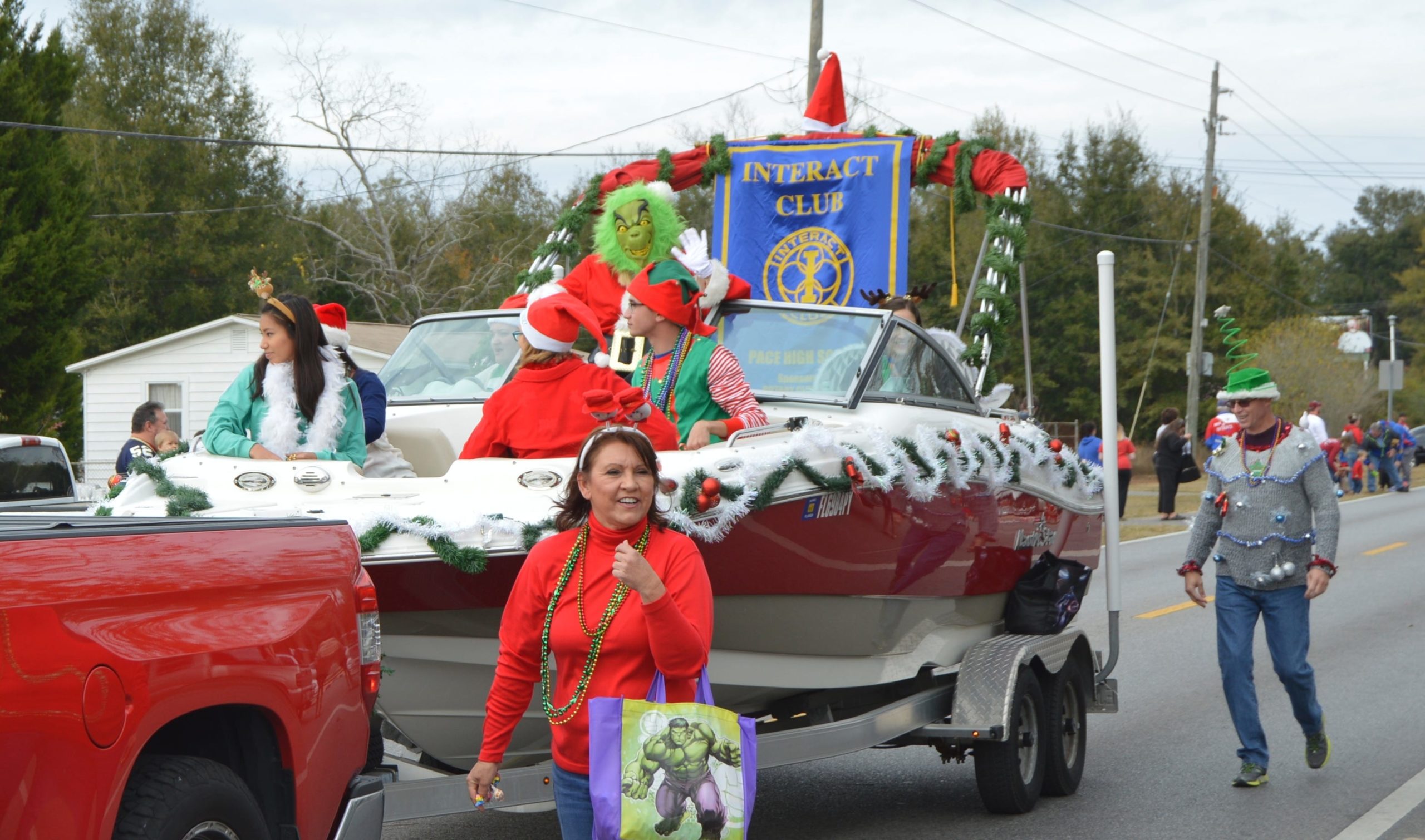 The Grinch made an appearance during Saturday’s Pace Christmas parade, courtesy of Rotary and Interact Club of Pace. (MATT BROWN | Press Gazette)