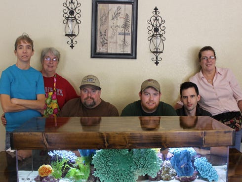 (left to right) Angela House, Steve’s sister; Paulett Evans, Steve’s mother-in-law; “Big Steve” himself; Stephen House Jr, Steve’s son; Anthony Asselin, Steve’s nephew; and Debora Pope, Steve’s aunt. They all play a part in Big Steve’s operation providing fresh, local seafood and other items for dining at All About Food or for catering.