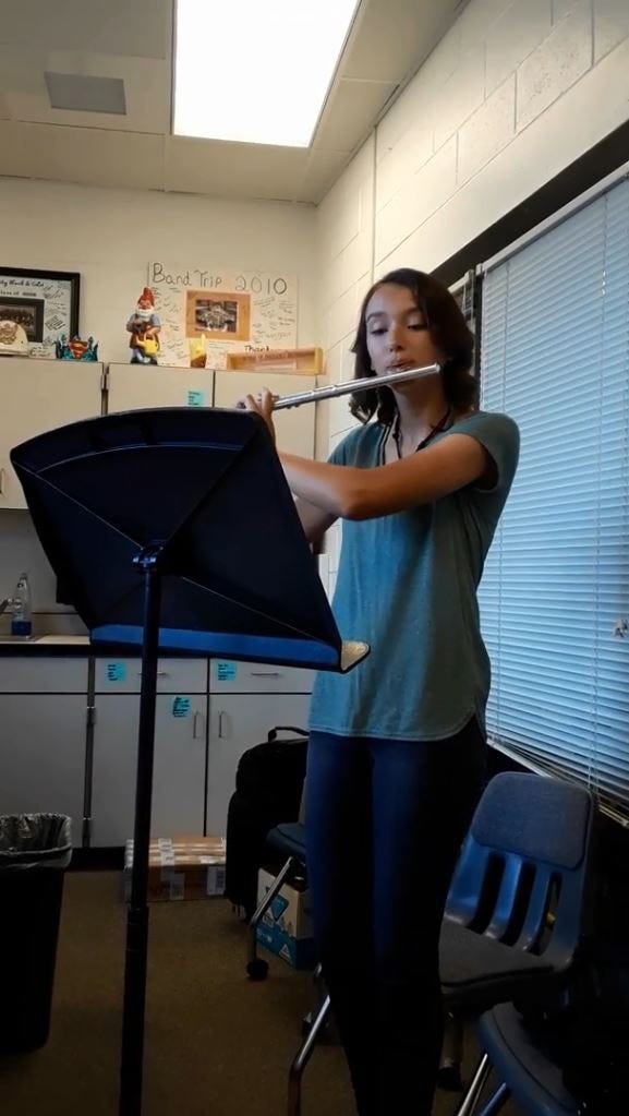 Adeline Belova plays her flute. [KEVIN BOYER | Press Gazette]