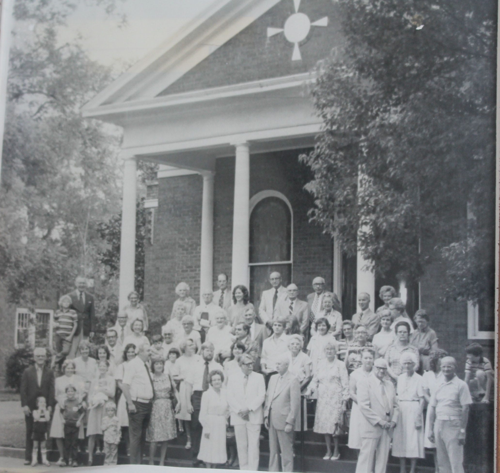 First Presbyterian Church members from the 1950s stand outside for a picture. [Special to the Press Gazette]