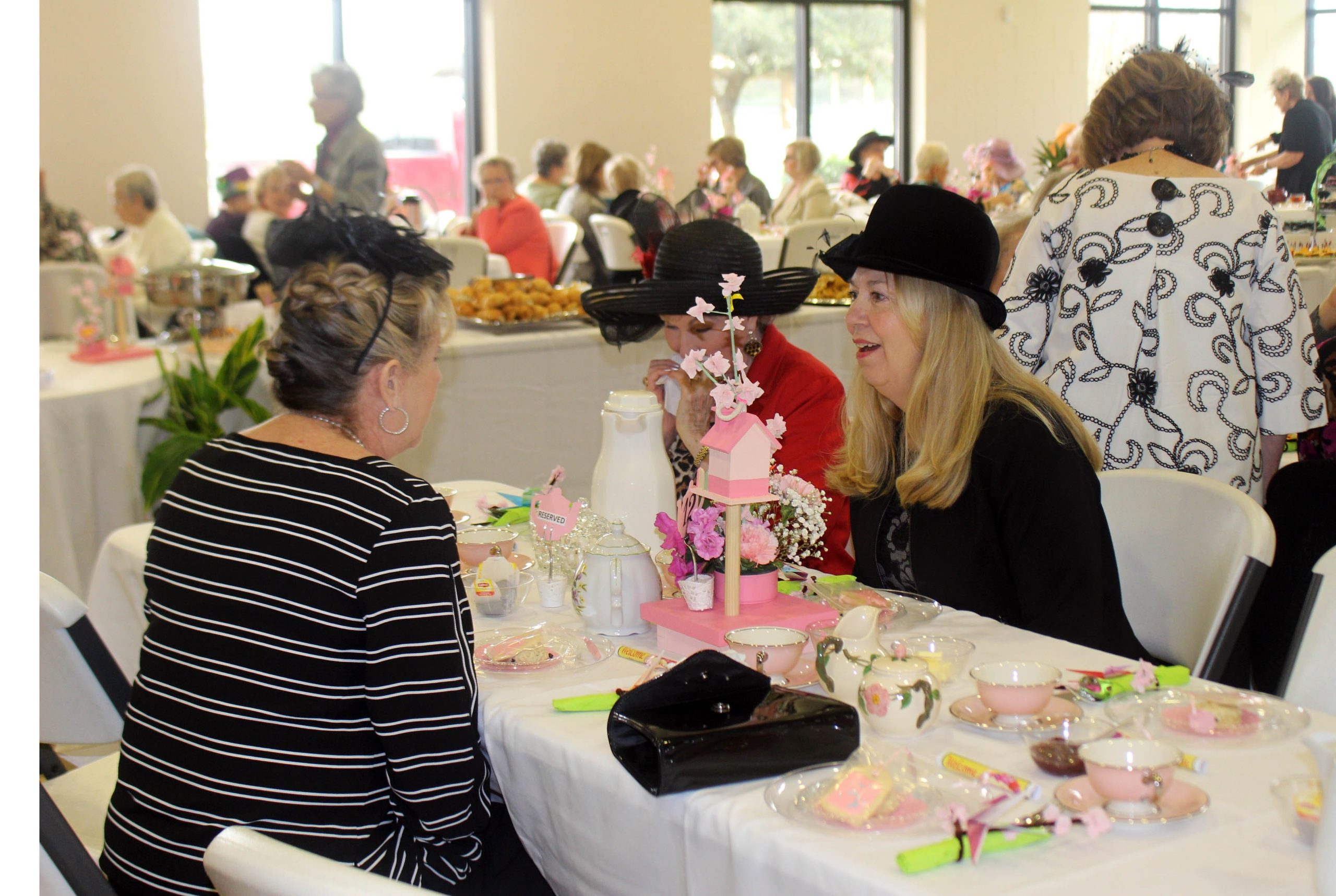 The Azalea Garden Club held their annual Elegant Spring Tea & Auction at the Pace Community Center. The event is the only fundraiser the club has for the year. [Ramon Rios/SRPG]