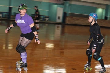 Emerald Cost Roller Derby President Tabitha “Thump” North follows ECRD’s Treasurer Debby “Deb Autry” Meyer, gearing up for this year’s roller derby season which began March 28.