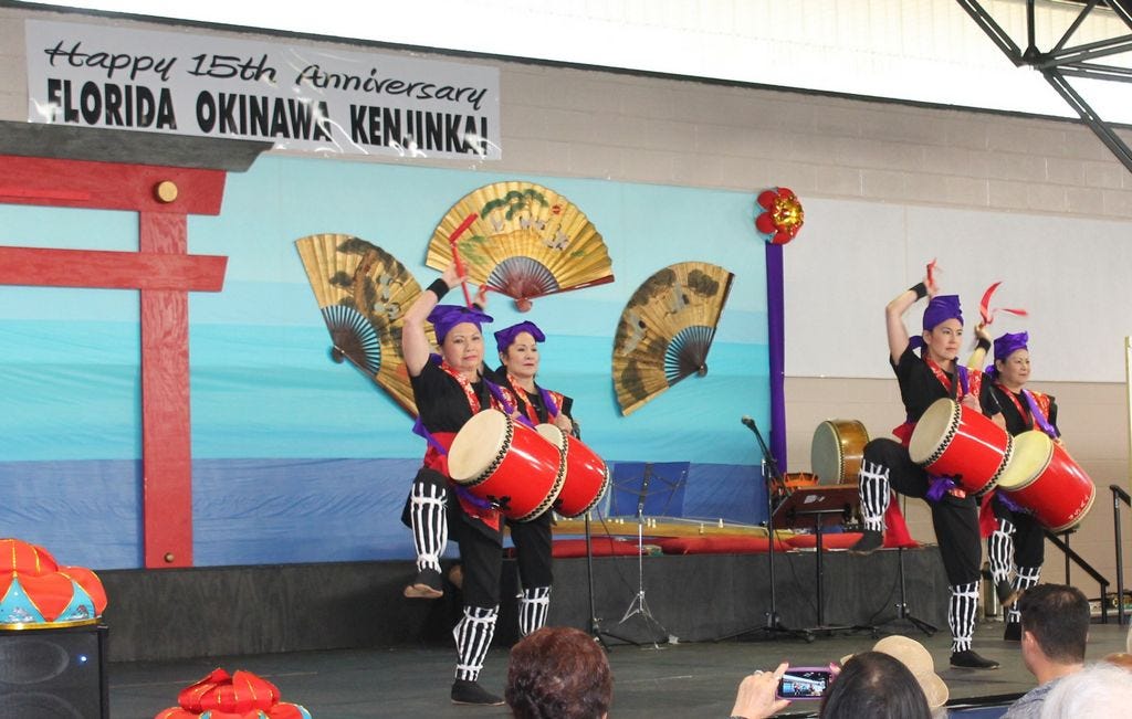 These performers played the traditional Taiko drum in a dance called Eisa. They are with the Michigan Okinawa Association of Chimugukuru-Kai.