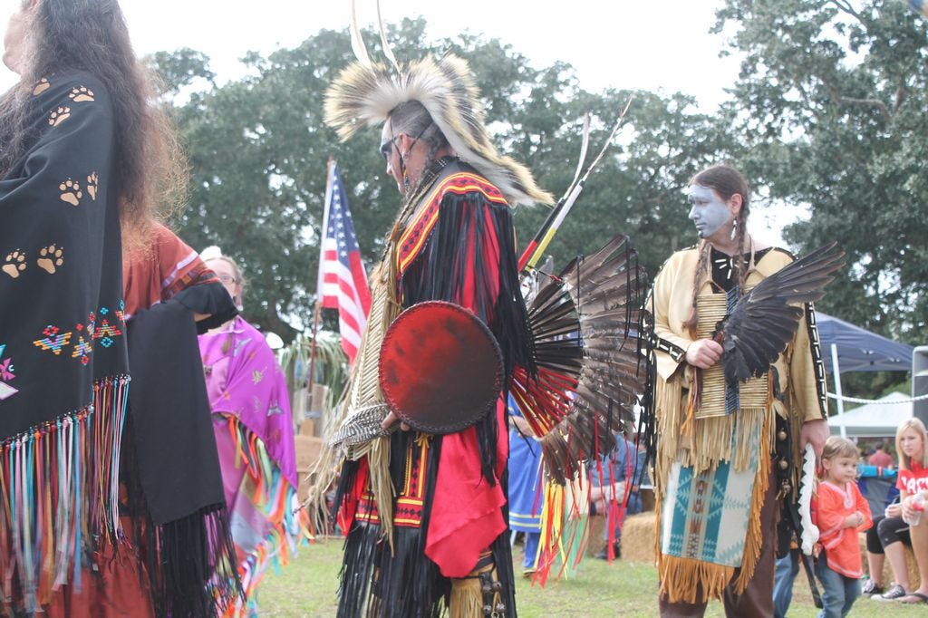 Dancers traveled around the sacred circle during the intertribal dance. In the middle is Head Man Dancer Bobby DuBose.