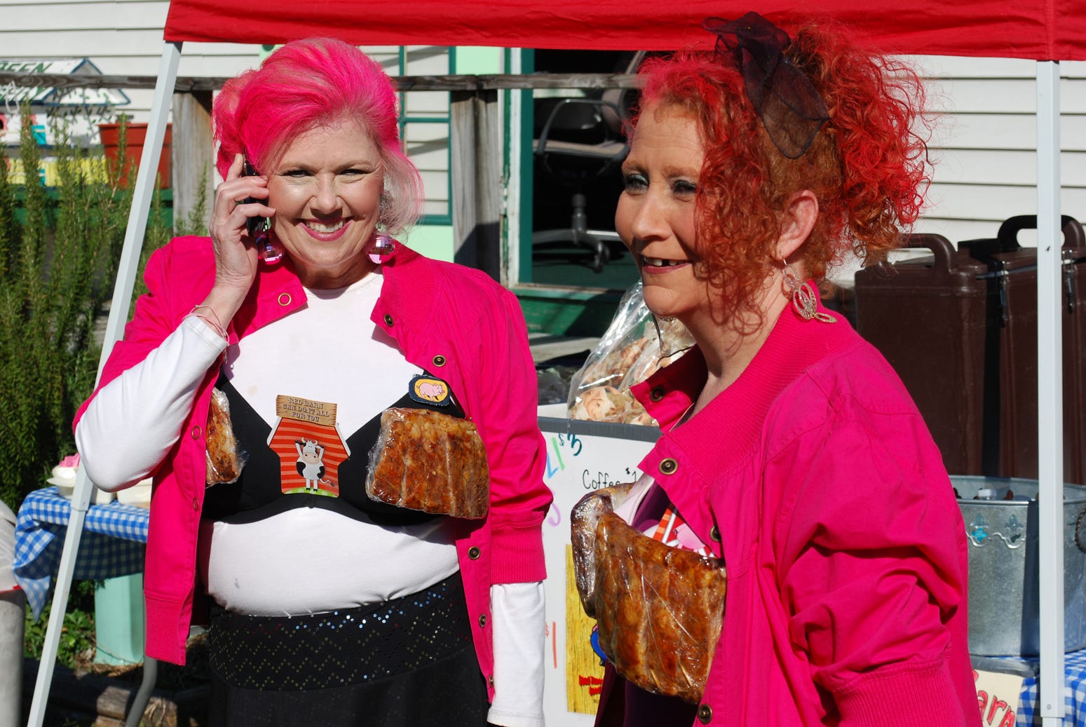 Cindy Brochu, left, and Robin Thomas from Red Barn Barbecue proved sometimes it’s ok to stare as they wore bras covered in a half rack of ribs.