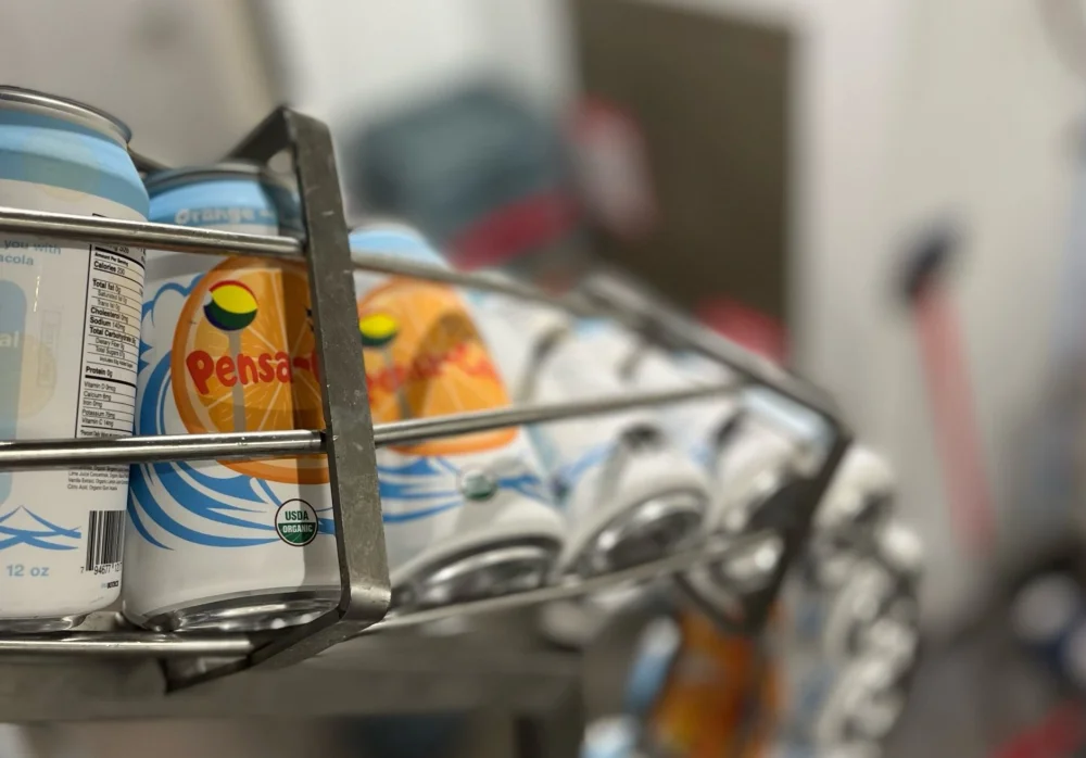 Pensa-Cola cans in the photograph published with the 2022 launch story